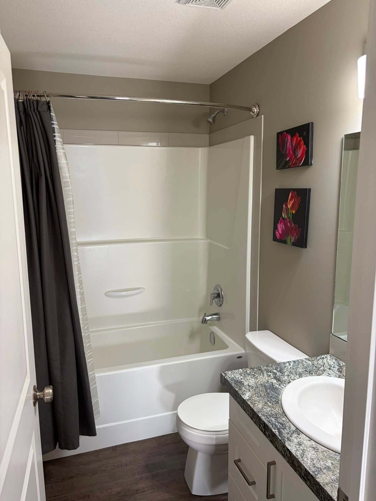 Bathroom with a soaker tub and freshly painted walls
